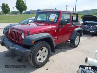 2013 Jeep Wrangler Sport z VIN 1C4GJWAG0DL543850, wystawiony jako IAAI lot #42374916 z przebiegiem 163 977 mil mil oraz . Historia ofert i sprzedaży dostępna na DreamBid. Obrazek 2.