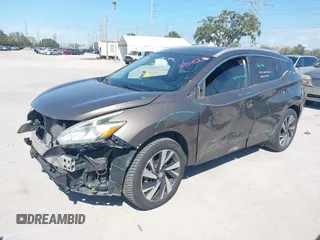 2015 Nissan Murano Platinum z VIN 5N1AZ2MG7FN230347, wystawiony jako IAAI lot #41545220 z przebiegiem 134 435 mil mil oraz . Historia ofert i sprzedaży dostępna na DreamBid. Obrazek 18.