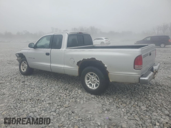 2001 Dodge Dakota with VIN 1B7GL22XX1S313638, listed as a Copart auction lot 43059385 with 114,298 mi miles and Salvage Title. Bid and sale history available at DreamBid. Image 2.