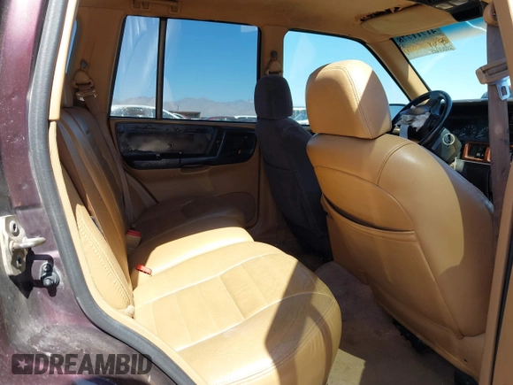 1996 Jeep Grand Cherokee Laredo with VIN 1J4GZ58S3TC391942, listed as a IAAI auction lot 41711778 with 202,765 mi miles. Bid and sale history available at carsss.com. Image 8.