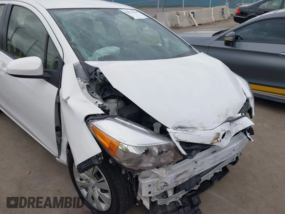 2013 Toyota Yaris L with VIN JTDKTUD38DD570483, listed as a IAAI auction lot 42071550 with 65,186 mi miles and . Bid and sale history available at DreamBid. Image 6.