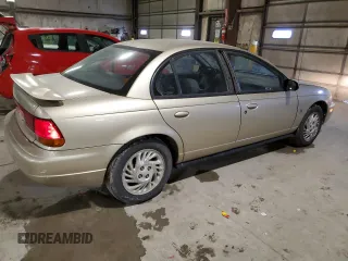 1999 Saturn SL z VIN 1G8ZK5277XZ266298, wystawiony jako Copart lot #41371855 z przebiegiem 85 882 mil mil oraz Szkoda całkowita • Salvage title. Historia ofert i sprzedaży dostępna na DreamBid. Obrazek 3.