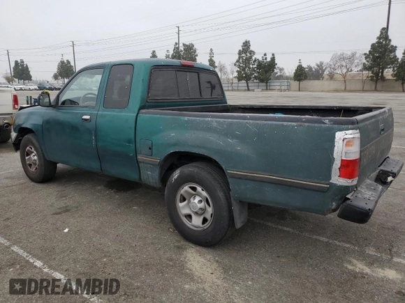 1996 Toyota T100 DX z VIN JT4TN12D2T0026690, wystawiony jako Copart lot #52937955 z przebiegiem 287 729 mil mil oraz Tytuł czysty. Historia ofert i sprzedaży dostępna na DreamBid. Obrazek 2.