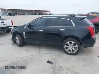 2015 Cadillac SRX Premium Collection z VIN 3GYFNDE3XFS576695, wystawiony jako IAAI lot #41612836 z przebiegiem Nie podano mil oraz . Historia ofert i sprzedaży dostępna na DreamBid. Obrazek 14.