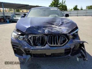 2023 BMW X6 M50i with VIN 5UXCY8C09P9P28422, listed as a Copart auction lot 52818133 with 4,131 mi miles and Salvage Title. Bid and sale history available at carsss.com. Image 5.