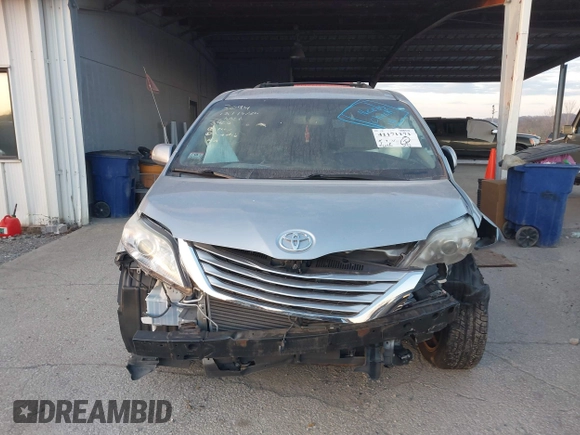 2016 Toyota Sienna LE with VIN 5TDJK3DC4GS133694, listed as a IAAI auction lot 41171171 with 99,680 mi miles. Bid and sale history available at carsss.com. Image 12.
