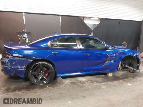 2022 Dodge Charger R/T with VIN 2C3CDXCT9NH127952, listed as a IAAI auction lot 42020401 with 55,483 mi miles and . Bid and sale history available at carsss.com. Image 14.