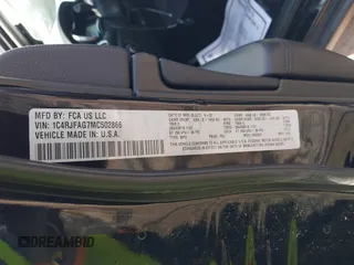 2021 Jeep Grand Cherokee Laredo X with VIN 1C4RJFAG7MC502866, listed as a IAAI auction lot 41841328 with 59,870 mi miles and . Bid and sale history available at DreamBid. Image 9.