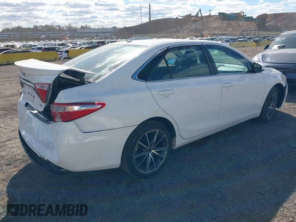 2015 Toyota Camry XLE with VIN 4T1BF1FK8FU040068, listed as a IAAI auction lot 40521641 with 25,156 mi miles and . Bid and sale history available at DreamBid. Image 4.