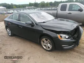 2014 Volvo S60 T5 z VIN YV1612FS7E2274717, wystawiony jako IAAI lot #42407453 z przebiegiem 138 878 mil mil oraz . Historia ofert i sprzedaży dostępna na DreamBid. Obrazek 1.