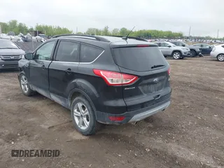 2015 Ford Escape SE with VIN 1FMCU9GX5FUB99018, listed as a IAAI auction lot 42250840 with 126,850 mi miles and . Bid and sale history available at DreamBid. Image 3.