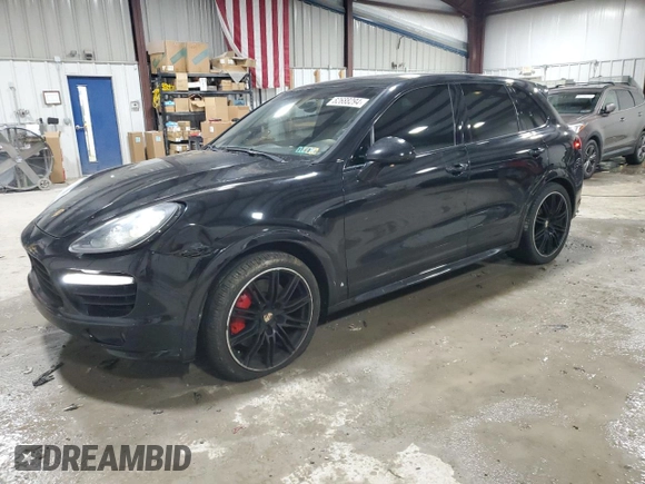 2012 Porsche Cayenne Turbo z VIN WP1AC2A21CLA84144, wystawiony jako Copart lot #82688294 z przebiegiem 124 143 mil mil oraz Szkoda całkowita • Salvage title. Historia ofert i sprzedaży dostępna na DreamBid. Obrazek 1.