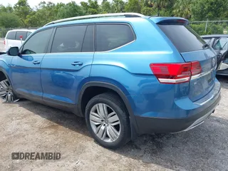 2019 Volkswagen Atlas SE z VIN 1V2WR2CA5KC524650, wystawiony jako IAAI lot #42217791 z przebiegiem 92 571 mil mil oraz . Historia ofert i sprzedaży dostępna na DreamBid. Obrazek 3.