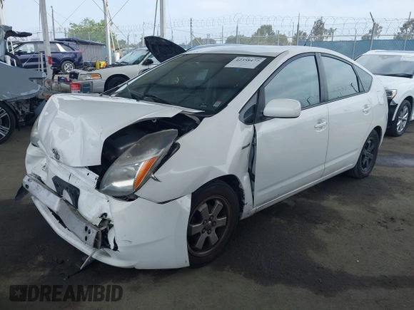 2008 Toyota Prius z VIN JTDKB20U483454957, wystawiony jako IAAI lot #42358477 z przebiegiem 256 781 mil mil oraz . Historia ofert i sprzedaży dostępna na DreamBid. Obrazek 18.