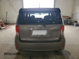 2012 Scion xB z VIN JTLZE4FE6C1145727, wystawiony jako Copart lot #54135915 z przebiegiem 111 652 mil mil oraz Szkody całkowita. Historia ofert i sprzedaży dostępna na DreamBid. Obrazek 6.