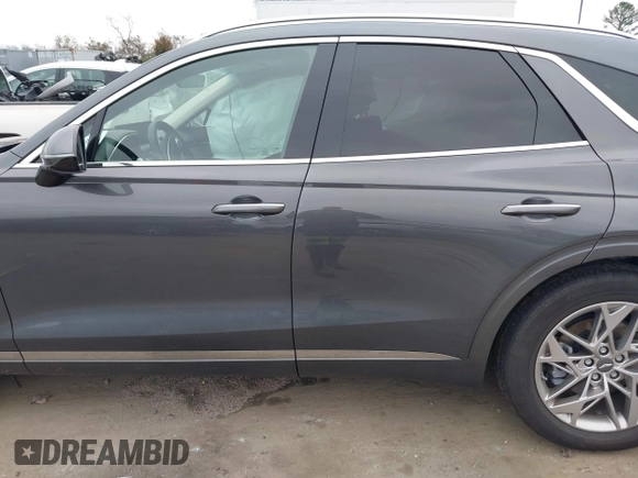 2022 Genesis GV70 2.5T with VIN KMUMADTB2NU059678, listed as a IAAI auction lot 41479833 with 30,598 mi miles and . Bid and sale history available at DreamBid. Image 14.