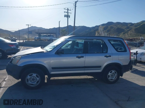 2003 Honda CR-V LX z VIN JHLRD684X3C009798, wystawiony jako IAAI lot #41957620 z przebiegiem 217 240 mil mil oraz . Historia ofert i sprzedaży dostępna na DreamBid. Obrazek 14.