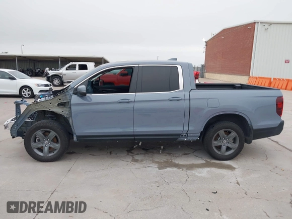 2023 Honda Ridgeline RTL with VIN 5FPYK3F58PB047099, listed as a IAAI auction lot 42313390 with Not provided miles and . Bid and sale history available at DreamBid. Image 15.