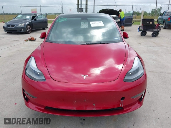 2023 Tesla Model 3 with VIN 5YJ3E1EA0PF455058, listed as a IAAI auction lot 42201618 with 31,147 mi miles and . Bid and sale history available at DreamBid. Image 11.