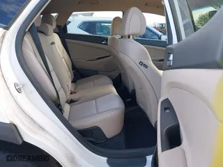 2016 Hyundai Tucson SE with VIN KM8J23A46GU224048, listed as a IAAI auction lot 41860584 with 137,938 mi miles. Bid and sale history available at carsss.com. Image 8.