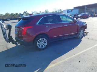 2018 Cadillac XT5 FWD with VIN 1GYKNARS4JZ211455, listed as a IAAI auction lot 41257536 with 102,032 mi miles and . Bid and sale history available at DreamBid. Image 4.