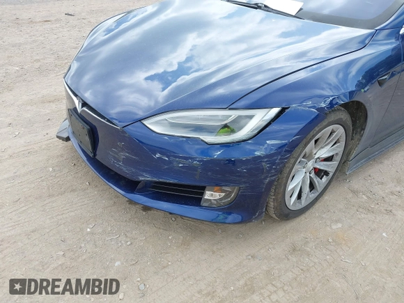2016 Tesla Model S 90D with VIN 5YJSA1E4XGF168165, listed as a IAAI auction lot 42220139 with Not provided miles and . Bid and sale history available at DreamBid. Image 6.