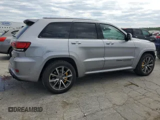 2018 Jeep Grand Cherokee Trackhawk with VIN 1C4RJFN91JC223825, listed as a Copart auction lot 58011465 with 83,177 mi miles and Salvage title. Bid and sale history available at DreamBid. Image 3.