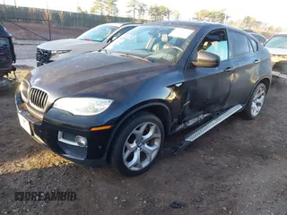 2014 BMW X6 xDrive35i with VIN 5UXFG2C52E0C45044, listed as a IAAI auction lot 41711013 with 120,840 mi miles. Bid and sale history available at carsss.com. Image 2.