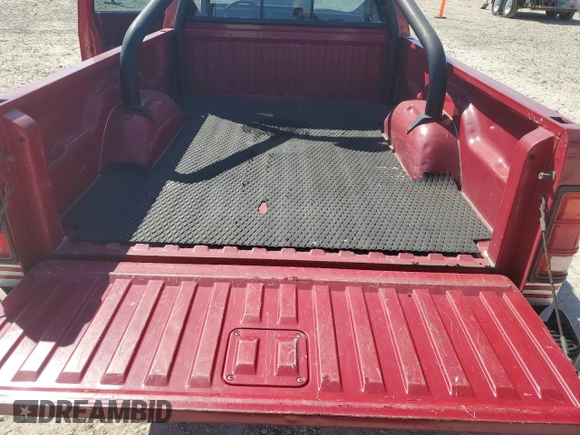 1989 Dodge Dakota z VIN 1B7GG66X6KS127702, wystawiony jako Copart lot #43276685 z przebiegiem 121 862 mil mil oraz Czysty tytuł • Clean title. Historia ofert i sprzedaży dostępna na DreamBid. Obrazek 10.
