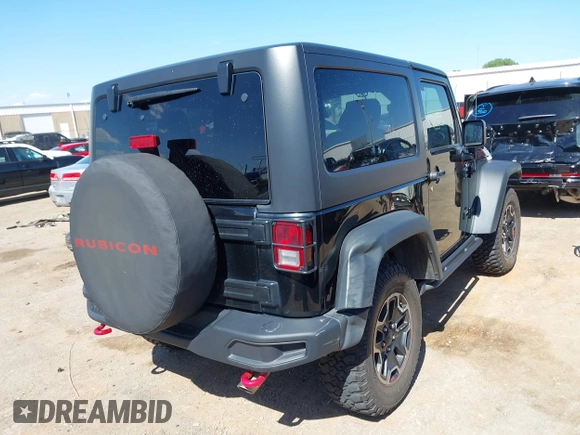 2015 Jeep Wrangler Rubicon Hard Rock with VIN 1C4BJWCG1FL610028, listed as a IAAI auction lot 42318569 with 48,627 mi miles and . Bid and sale history available at DreamBid. Image 4.