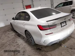 2020 BMW 3 Series M340i xDrive with VIN WBA5U9C08LFJ73063, listed as a IAAI auction lot 41513641 with 52,431 mi miles and . Bid and sale history available at DreamBid. Image 3.