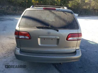 2001 Toyota Sienna LE with VIN 4T3ZF13C11U390198, listed as a Copart auction lot 76785094 with 200,803 mi miles and Salvage Title. Bid and sale history available at carsss.com. Image 6.