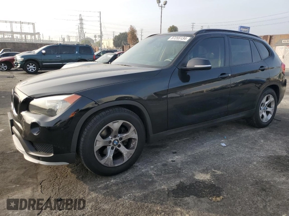 2015 BMW X1 sDrive28i with VIN WBAVM1C50FV315123, listed as a Copart auction lot 87255134 with 96,063 mi miles and Salvage Title. Bid and sale history available at carsss.com. Image 1.