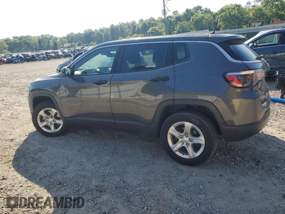 2023 Jeep Compass Sport with VIN 3C4NJDAN0PT572204, listed as a Copart auction lot 52490095 with 8,284 mi miles and Salvage title. Bid and sale history available at DreamBid. Image 2.
