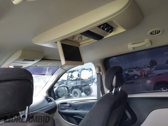2016 Dodge Grand Caravan SXT with VIN 2C4RDGCG3GR242133, listed as a IAAI auction lot 40412052 with 95,091 mi miles and . Bid and sale history available at DreamBid. Image 19.
