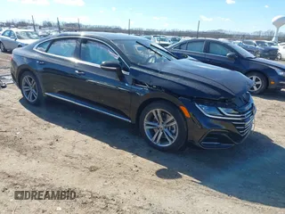 2022 Volkswagen Arteon SE R-Line z VIN WVWSR7ANXNE009669, wystawiony jako IAAI lot #41689538 z przebiegiem 26 914 mil mil oraz . Historia ofert i sprzedaży dostępna na DreamBid. Obrazek 1.