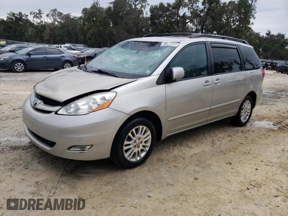 2009 Toyota Sienna XLE with VIN 5TDBK22C89S027706, listed as a Copart auction lot 88672015 with 215,515 mi miles and Salvage Title. Bid and sale history available at DreamBid. Image 1.