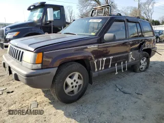 1993 Jeep Grand Cherokee Laredo with VIN 1J4GZ58S8PC656490, listed as a Copart auction lot 49377485 with 236,215 mi miles and Salvage Title. Bid and sale history available at carsss.com. Image 1.
