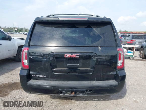 2015 GMC Yukon SLT with VIN 1GKS1BKC1FR539194, listed as a IAAI auction lot 41864424 with 1 mi miles. Bid and sale history available at carsss.com. Image 16.