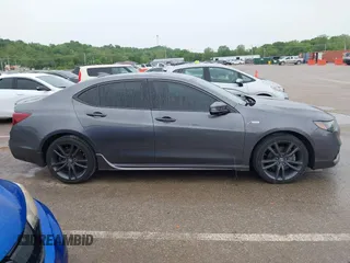 2019 Acura TLX w/A-Spec Pkg z VIN 19UUB2F61KA000932, wystawiony jako IAAI lot #42164064 z przebiegiem 79 080 mil mil oraz . Historia ofert i sprzedaży dostępna na DreamBid. Obrazek 13.