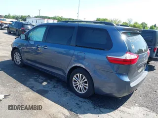 2015 Toyota Sienna XLE with VIN 5TDYK3DC0FS649998, listed as a IAAI auction lot 42531828 with 111,539 mi miles and . Bid and sale history available at DreamBid. Image 3.