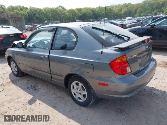 2003 Hyundai Accent GL z VIN KMHCG35CX3U243322, wystawiony jako IAAI lot #42277841 z przebiegiem 45 855 mil mil oraz . Historia ofert i sprzedaży dostępna na DreamBid. Obrazek 3.