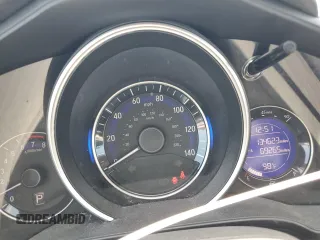 2015 Honda Fit LX z VIN 3HGGK5H52FM738587, wystawiony jako Copart lot #61231705 z przebiegiem 134 623 mil mil oraz Szkoda całkowita • Salvage title. Historia ofert i sprzedaży dostępna na DreamBid. Obrazek 9.