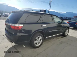 2013 Dodge Durango Crew z VIN 1C4RDJDG7DC584541, wystawiony jako Copart lot #55957665 z przebiegiem 142 639 mil mil oraz Czysty tytuł • Clean title. Historia ofert i sprzedaży dostępna na DreamBid. Obrazek 3.