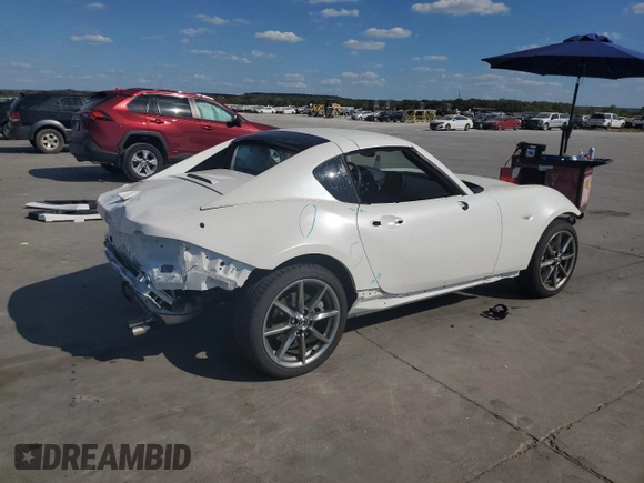 2023 Mazda MX-5 Miata Grand Touring with VIN JM1NDAM76P0561207, listed as a Copart auction lot 72202434 with 6,928 mi miles and Salvage title. Bid and sale history available at DreamBid. Image 3.