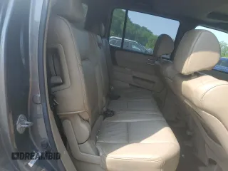 2009 Honda Pilot EX-L z VIN 5FNYF48559B004021, wystawiony jako Copart lot #59282595 z przebiegiem 215 844 mil mil oraz Nie do naprawy • Non repairable. Historia ofert i sprzedaży dostępna na DreamBid. Obrazek 11.