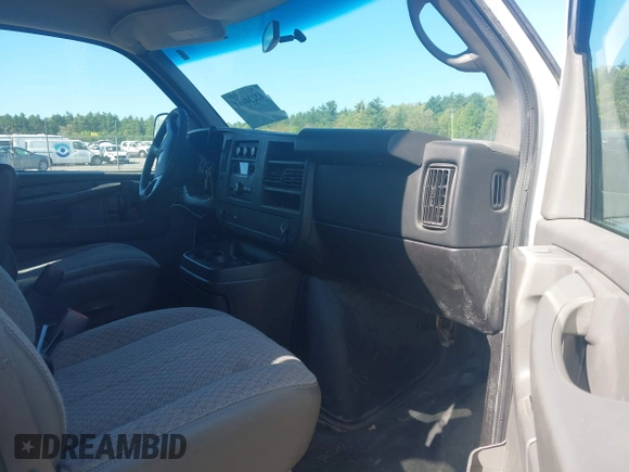 2014 Chevrolet Express Cargo with VIN 1GCWGGCA5E1125676, listed as a IAAI auction lot 42234161 with 285,045 mi miles and . Bid and sale history available at DreamBid. Image 5.