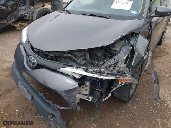 2020 Toyota C-HR LE with VIN JTNKHMBX0L1073916, listed as a IAAI auction lot 41720784 with 96,730 mi miles. Bid and sale history available at carsss.com. Image 6.