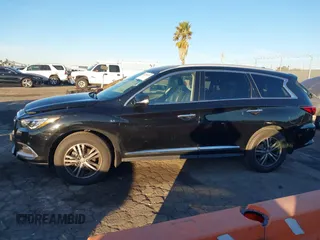 2020 Infiniti QX60 Pure with VIN 5N1DL0MNXLC505914, listed as a IAAI auction lot 41336979 with 53,813 mi miles and . Bid and sale history available at DreamBid. Image 14.