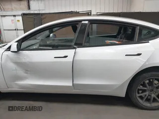 2023 Tesla Model 3 Long Range with VIN 5YJ3E1EB3PF603955, listed as a IAAI auction lot 41915541 with 33,691 mi miles and . Bid and sale history available at DreamBid. Image 14.